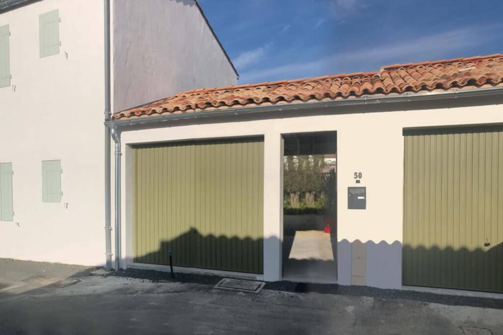L'Oiseliere ------- Nul Part Ailleurs Villa Loix Exterior photo